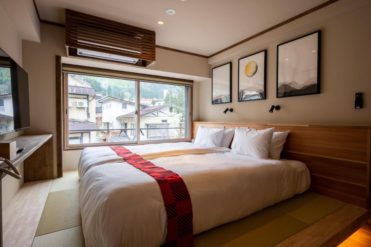 Kawamotoya Hotel Nozawaonsen Buitenkant foto