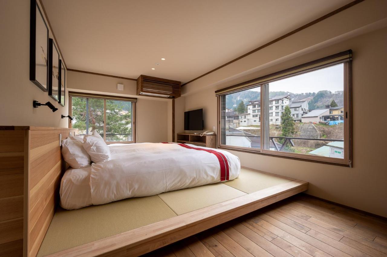 Kawamotoya Hotel Nozawaonsen Buitenkant foto